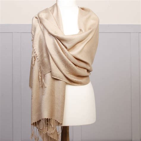 Pashmina collection - Discover the Beauty of Pashmina Scarves for Women. The Pashmina Scarf holds an undeniable allure with its softness, warmth, and sheer elegance. A pashmina scarf is not just a piece of clothing; it's an experience that engulfs your senses with the touch of plush cashmere wool and is a sight to behold with its intricate designs and rich, vibrant colors.
